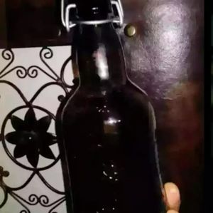 VINTAGE GROLSCH AMBER EMPTY BOTTLE, PORCELAIN CAP.